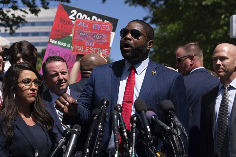 Rep. Byron Donalds, R-Fla., accompanied by other members of congress, speaks to the media after they toured the George Washington University students encampment as they protest over the Israel-Hamas war on Wednesday, May 1, 2024, in Washington. (AP Photo/Jose Luis Magana)